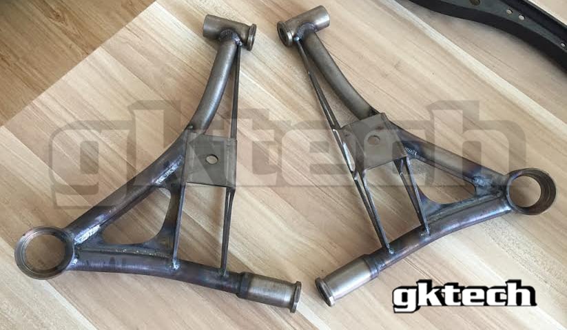 First manufactured assemblies of rear lower control arms